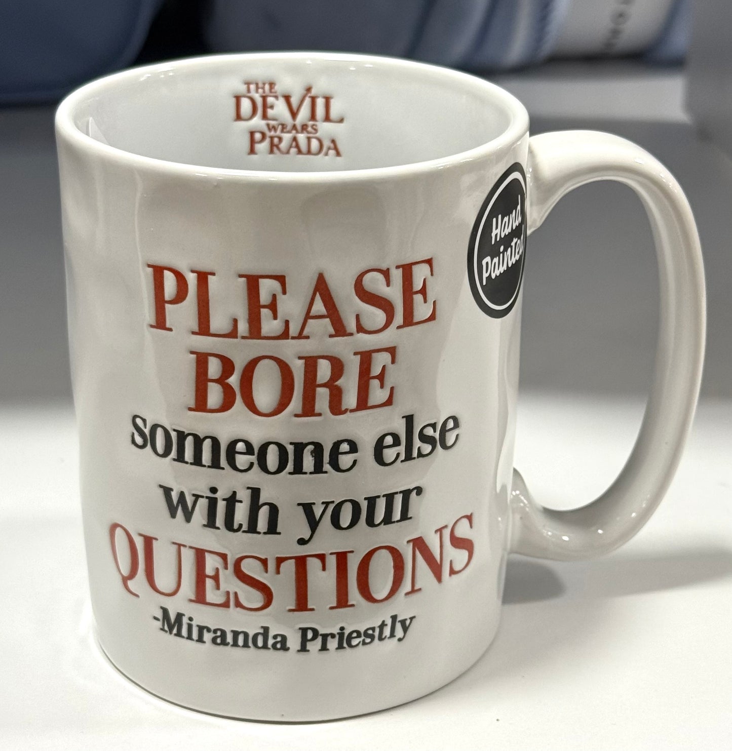 New The Devil Wears Prada ceramic coffee mug PLEASE BORE SOMEONE ELSE WITH YOUR QUESTIONS
