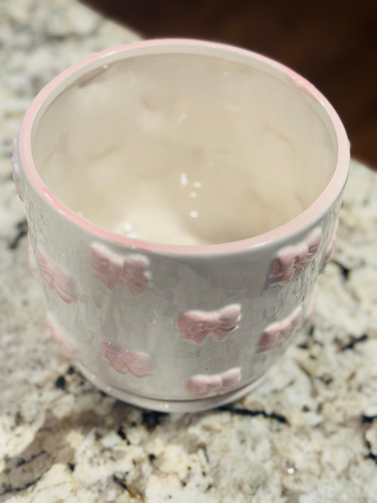 New pink and white ceramic raised bow print planter decor