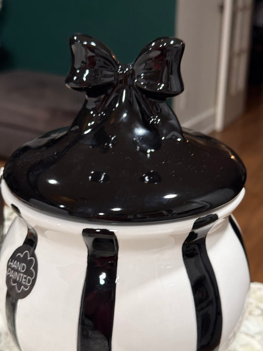 New black and white striped bow topped decorative canister 11”