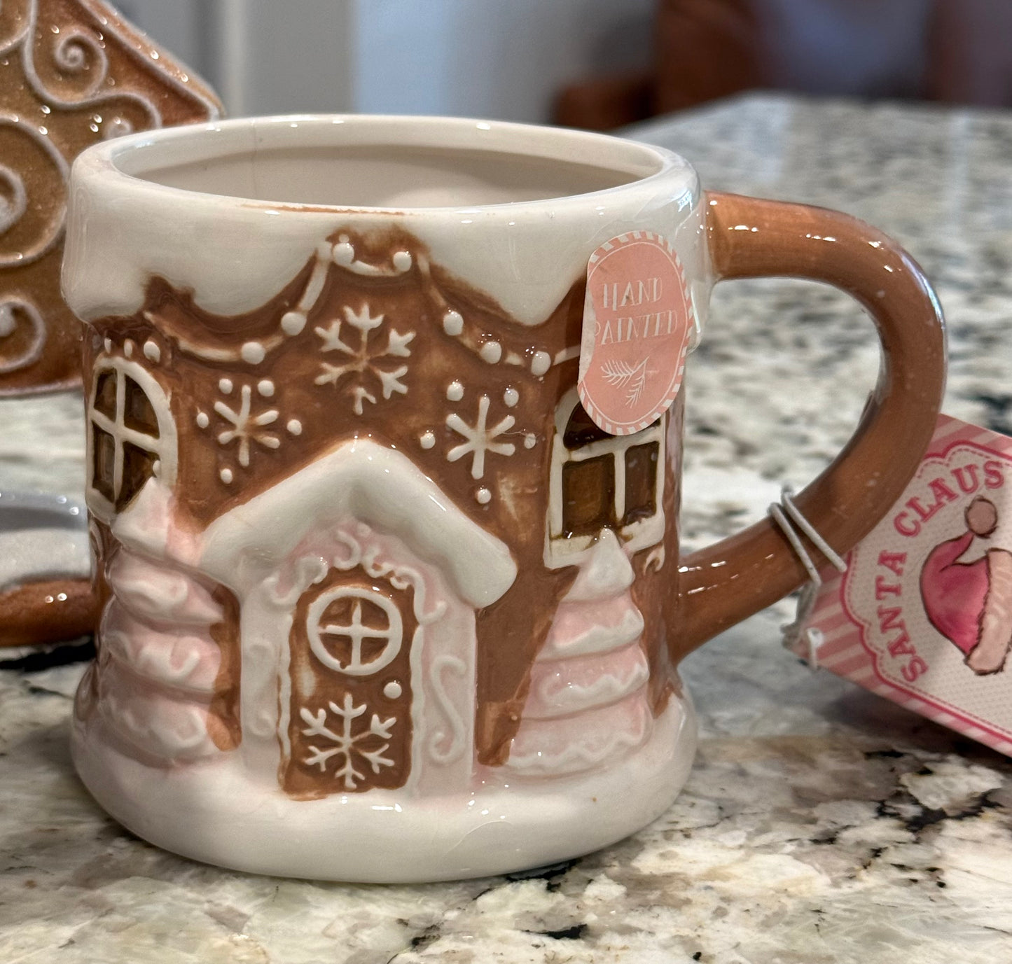 New 4-piece pink gingerbread Christmas lot. 2-8” resin trees, mini house, ceramic mug