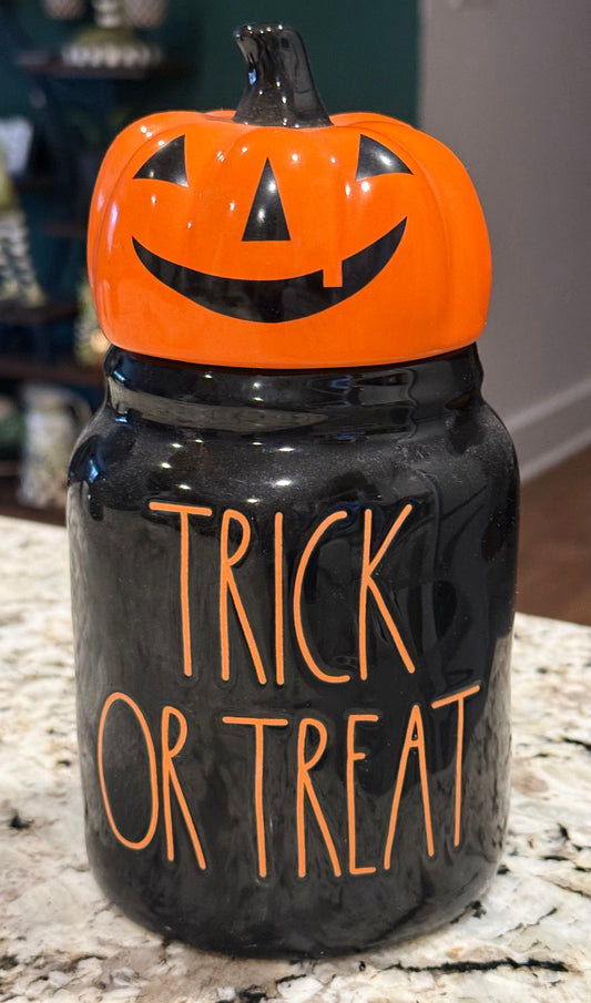 New Rae Dunn black iridescent ceramic pumpkin face topped Halloween canister TRICK OR TREAT