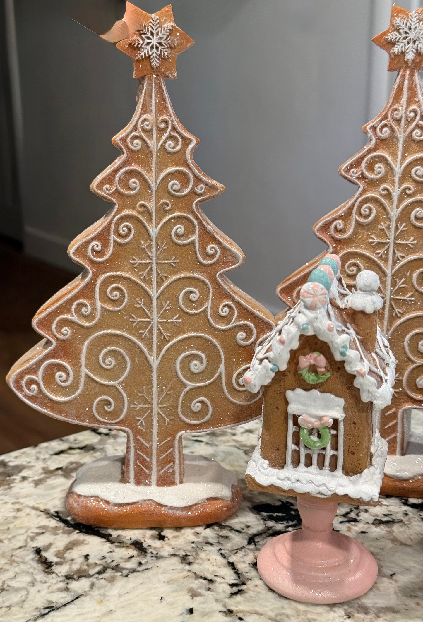 New 4-piece pink gingerbread Christmas lot. 2-8” resin trees, mini house, ceramic mug