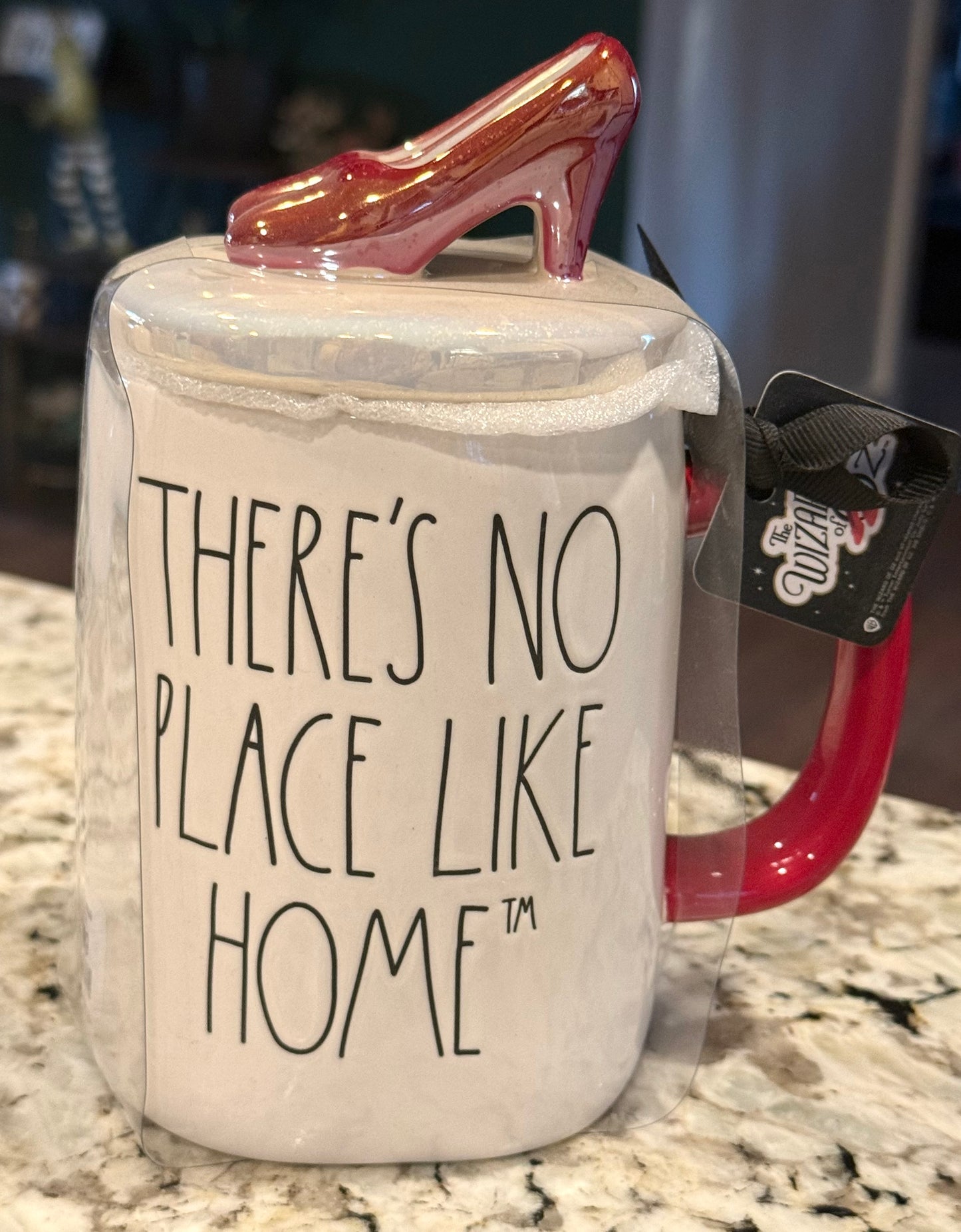 New Rae Dunn x Wizard of Oz white ceramic red slipper topped coffee mug THERE’S NO PLACE LIKE HOME