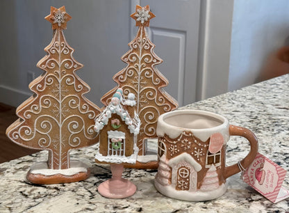New 4-piece pink gingerbread Christmas lot. 2-8” resin trees, mini house, ceramic mug
