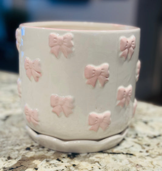 New pink and white ceramic raised bow print planter decor