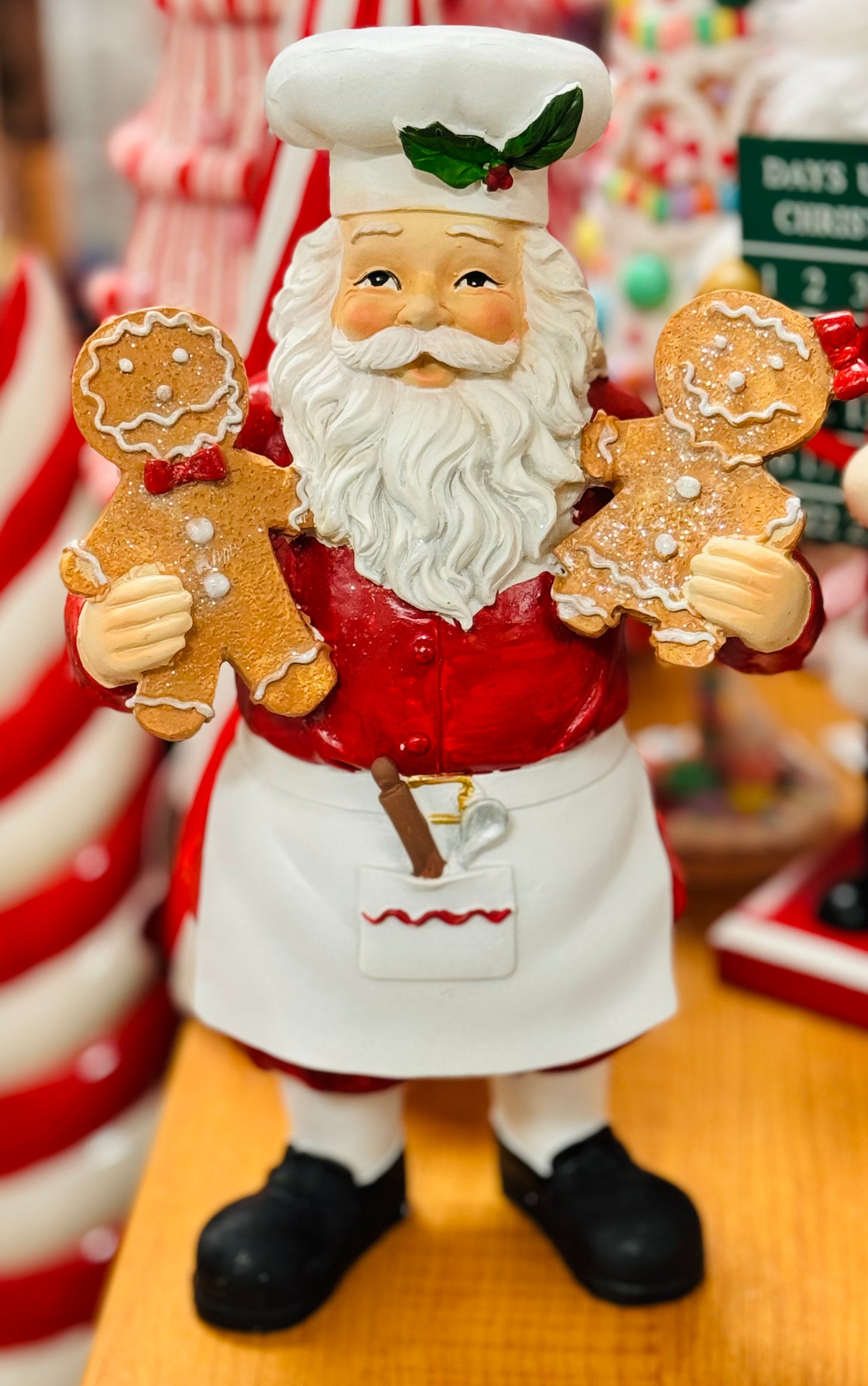 New Resin 8.75” Traditional baking Santa decor with gingerbread cookies