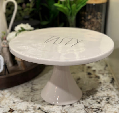 New Rae Dunn white ceramic TASTY cake 🍰 stand 12.5x7