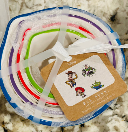 New Release Rae Dunn x Pixar’s Toy Store white ceramic measuring cup set