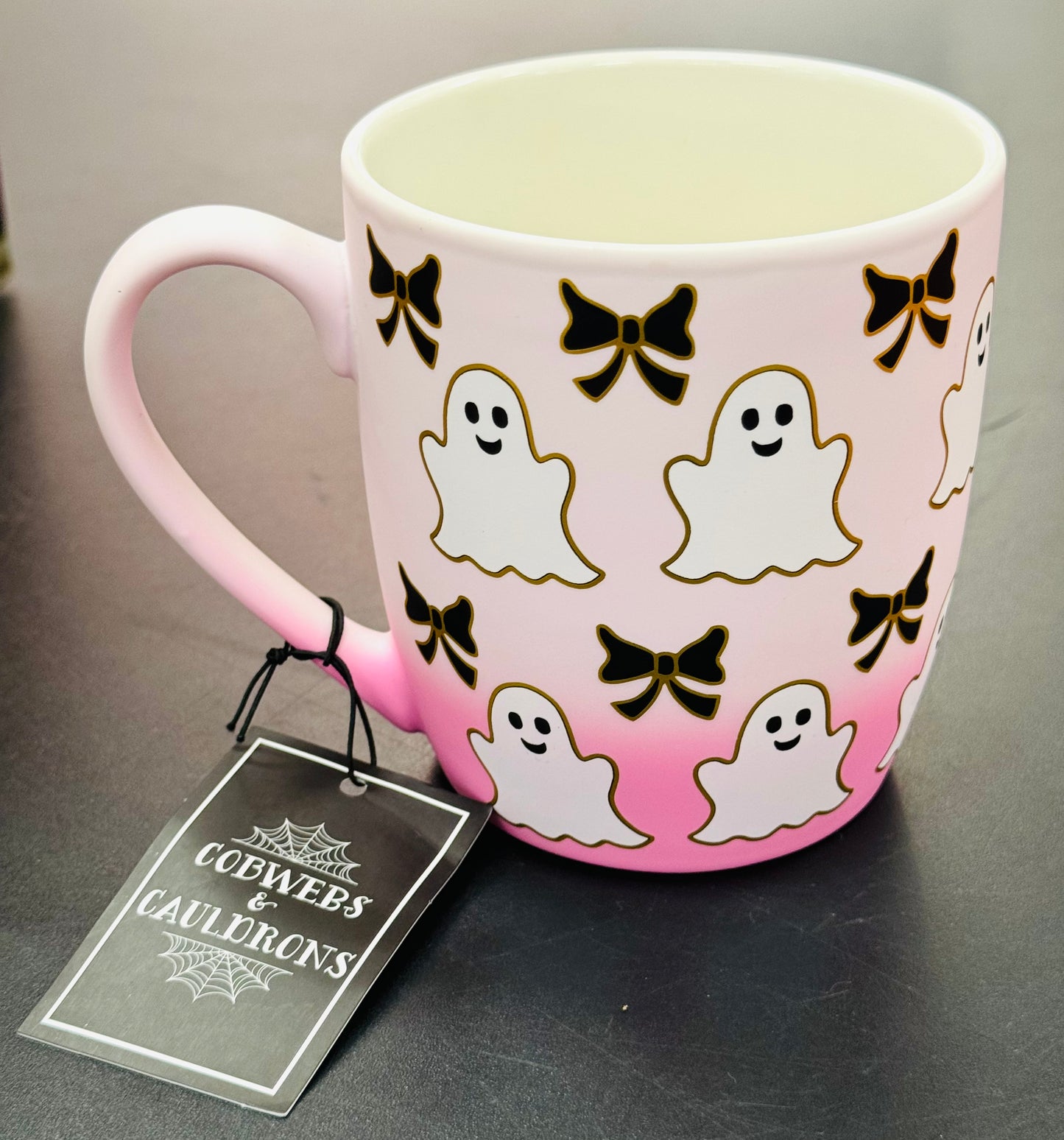 New Cobwebs and Caldron pink ghost bow ceramic coffee mug