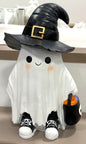 New white resin ghost with hat, shoes, and treat bag