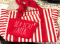 New Rae Dunn large 18x14 red striped beach tote set. 2-zip closure wristlets included SEA YOU LATER