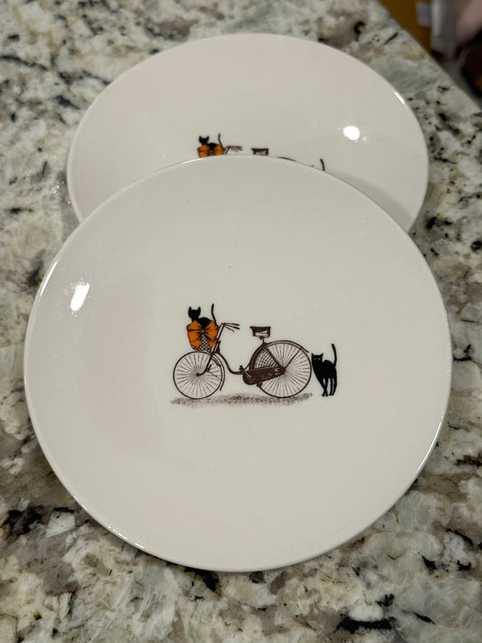 Rae Dunn ceramic 2-piece 6” once Halloween cat/bicycle plate set