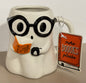 New white ceramic ghost reading with glasses Halloween coffee mug