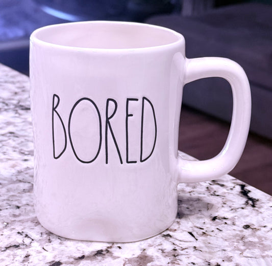 Rae Dunn white ceramic coffee mug BORED