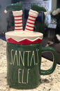 New green ceramic Rae Dunn SANTA’S ELF Christmas ELF LEGS topped coffee mug