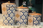 New Made in India ceramic blue print 3-piece canister set. Wood lid, gold top. 9”, 7.5”, 5”